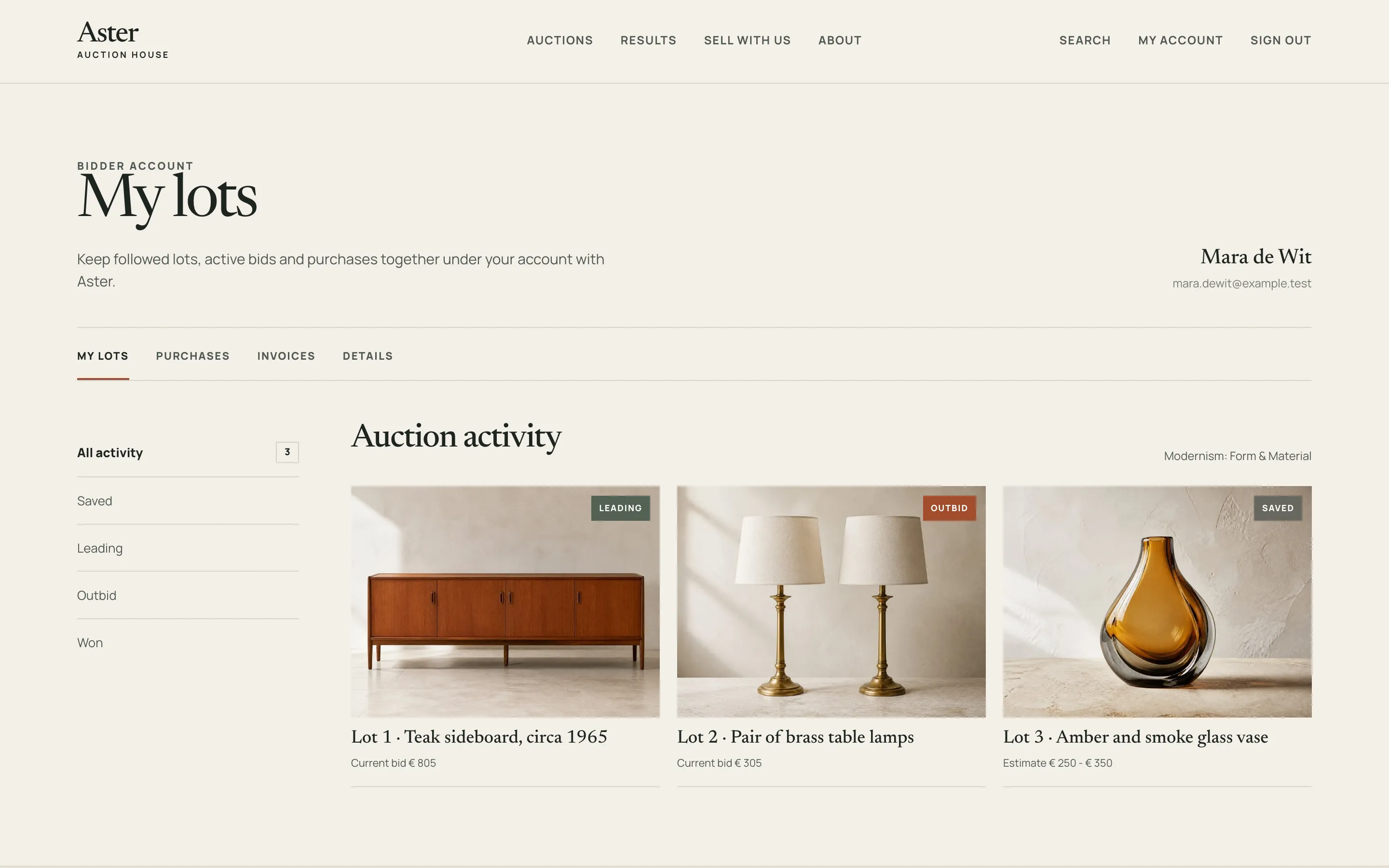 The bidder account showing a leading bid, an outbid lot and a saved lot